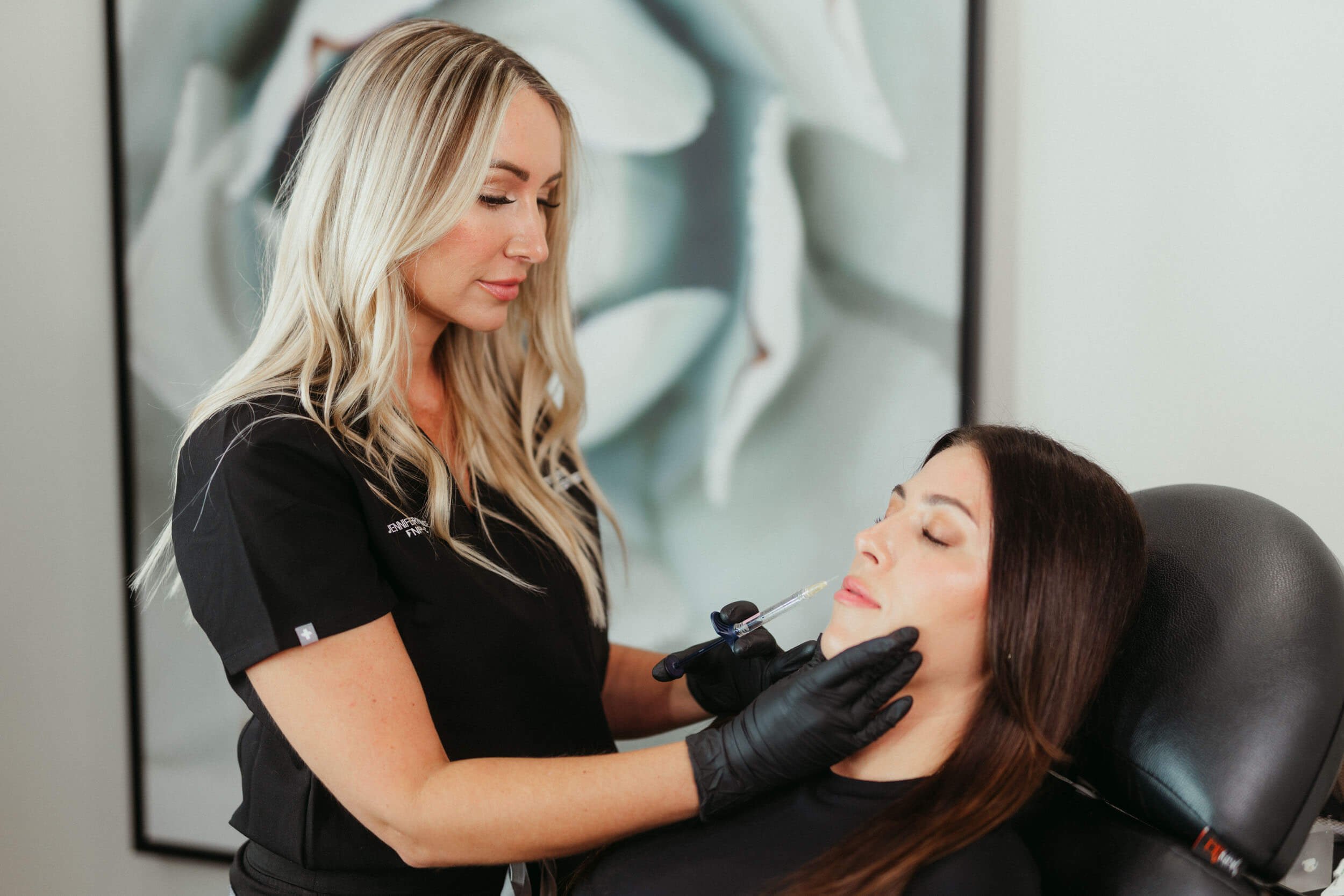 Practitioner performing treatment – Exion RF microneedling procedure Calabasas